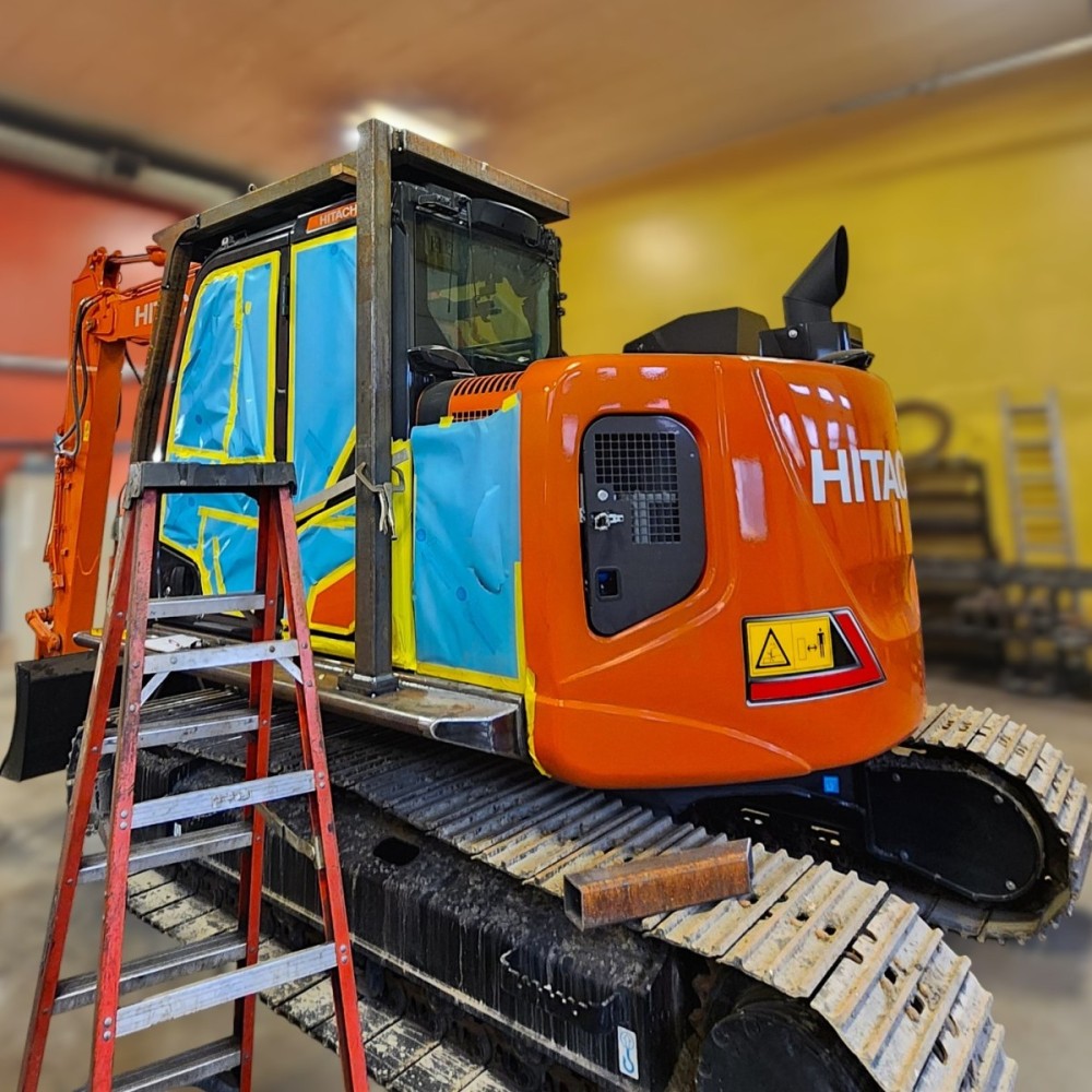 Hitachi ZX135US forestry excavator prior to high and wide modification and guarding