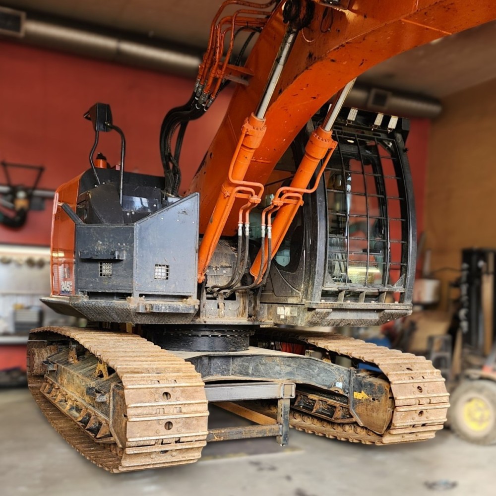 HITACHI ZX245US HIGH AND WIDE FORESTRY UNDERCARRIAGE CONVERSION BEFORE