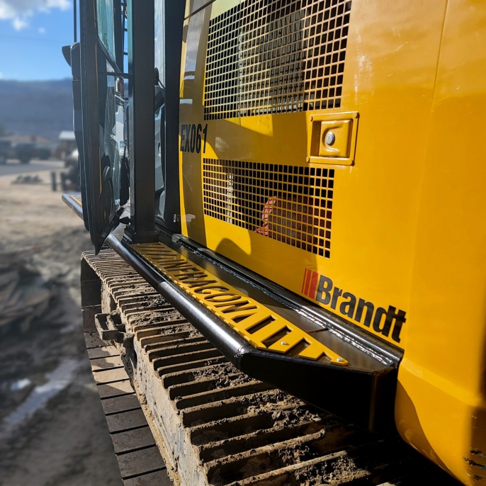Excavator catwalks installed on John Deere excavator