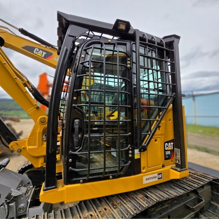 CAT 309 side view of excavator FOPS