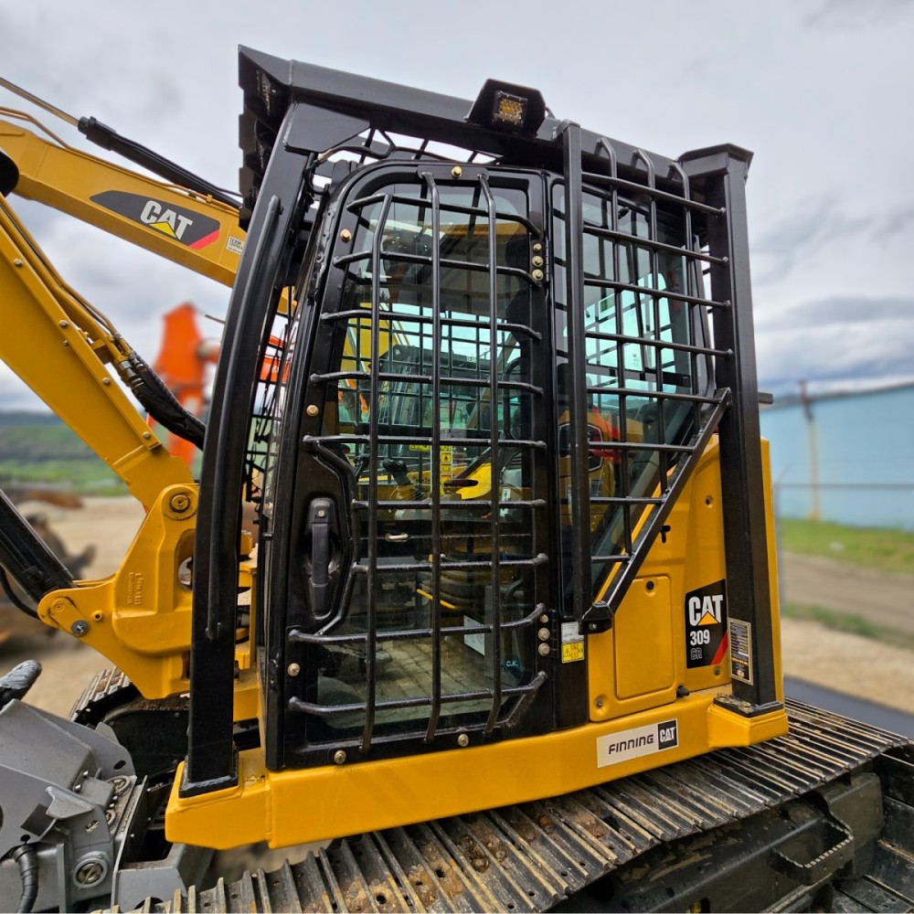 CAT 309 side view of excavator FOPS