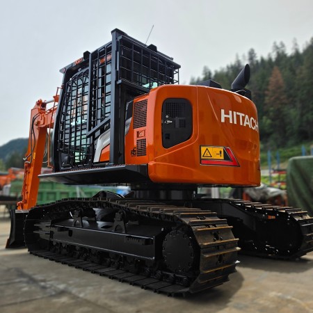 Hitachi ZX135 US with high and wide undercarriage modification