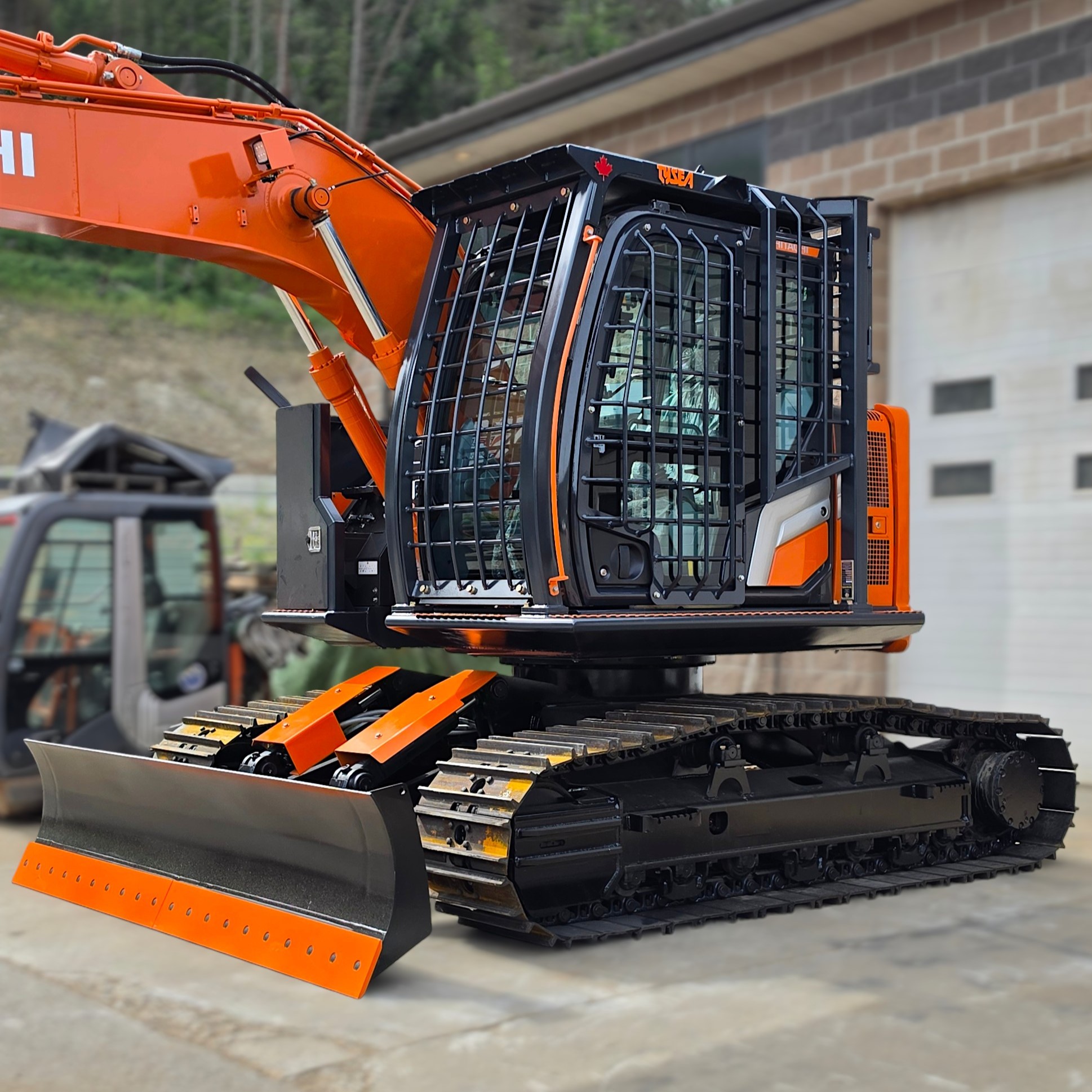 Orange Hitachi excavator with guarding and undercarriage conversion