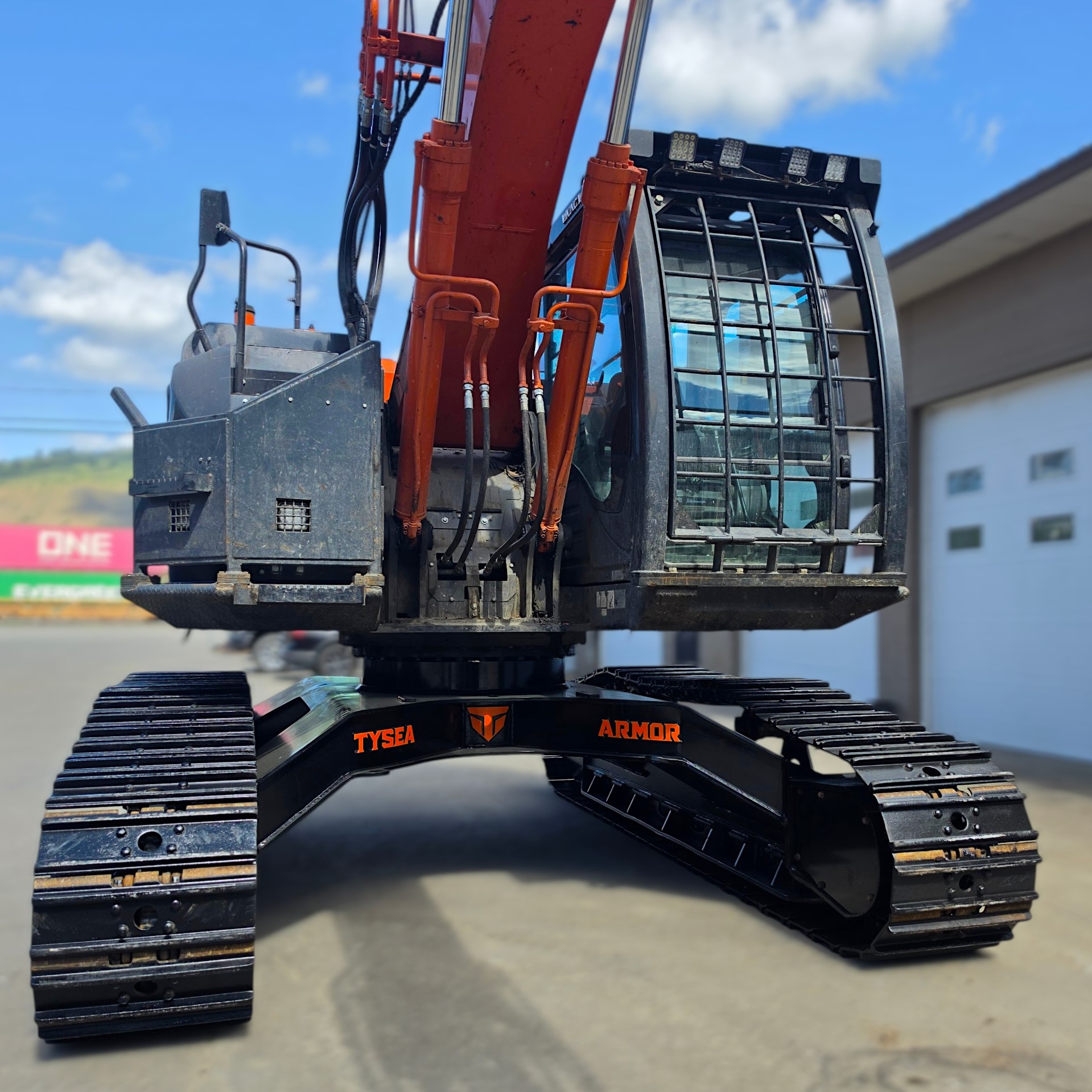 Hitachi ZX245 US with full undercarriage conversion to a high and wide